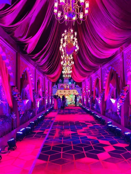 We believe in grand entrances. This royal Rajasthani-inspired passage, with its intricate architecture and dramatic lighting, sets the tone for a truly unforgettable, big-fat-Indian-wedding.