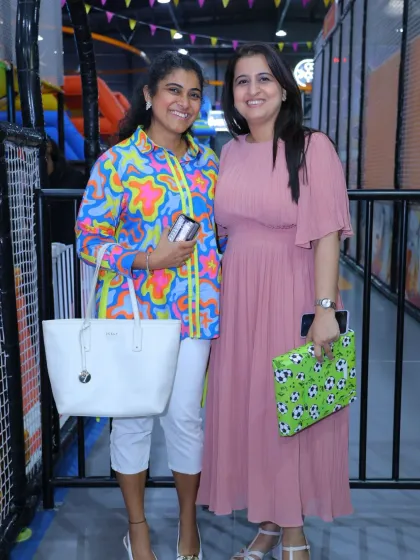 Two guests enjoying the party atmosphere. Our venue is designed for adults to have a great time too.