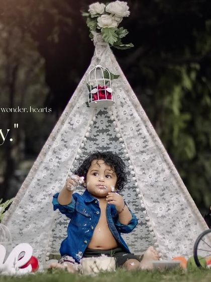 Eyes full of wonder, hearts full of joy. Another angle from a fun outdoor cake smash session, capturing his curiosity.