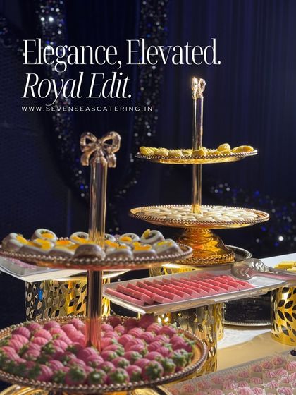 Elegance, elevated. Our royal edit of Indian and Western sweets, presented on ornate golden tiered stands, turns the dessert course into a spectacle of indulgence.