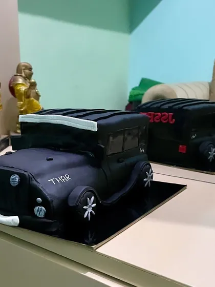 For the ultimate car enthusiast, I created this fully sculpted, three-dimensional Mahindra Thar cake. Every detail is handcrafted from fondant, making it a unique and impressive centerpiece for a hobby-themed birthday celebration.