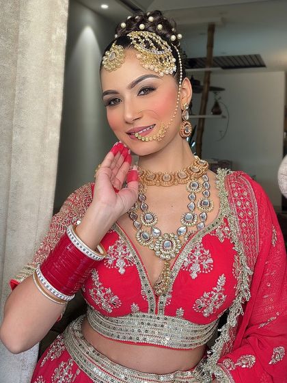 An extensive series of our classic red bridal lehenga. These images capture every detail, from the embroidery to the full bridal styling, providing a complete reference.