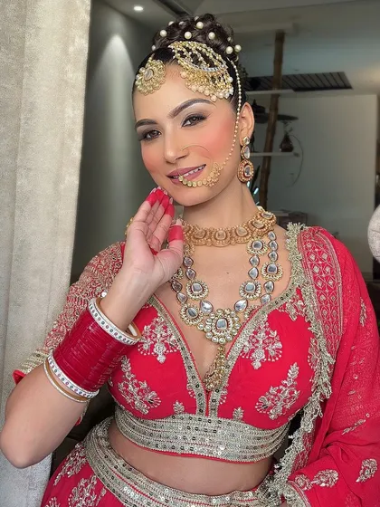 An extensive series of our classic red bridal lehenga. These images capture every detail, from the embroidery to the full bridal styling, providing a complete reference.