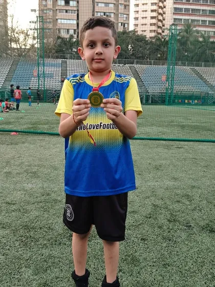 This young player earned his Player of the Month award for his consistency and positive attitude.
