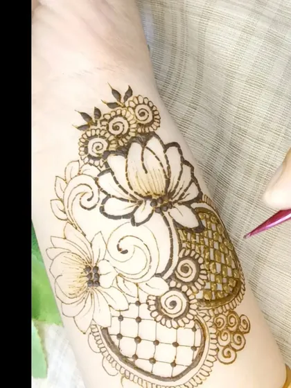 A floral patch design in progress, showing how I add shading and fine net details to create depth and texture.