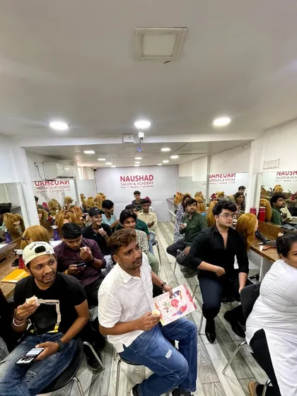 This is the energy of our academy. A full classroom means a space full of passion, questions, and real learning. You will be surrounded by others who are just as dedicated to mastering the craft of hairstyling.