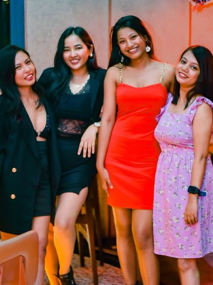 A group of friends dressed up and ready to party at Macaw. The style and vibe are always on point.