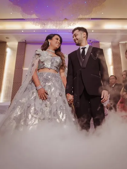 The couple's first dance on a cloud. I use special effects like dry ice to create a dreamy, romantic atmosphere for the reception, making their first dance as a married couple truly magical.
