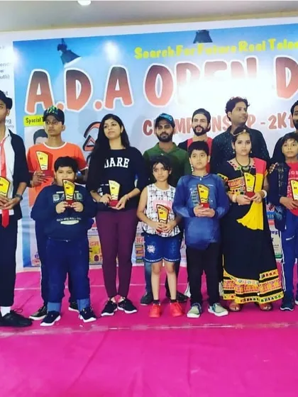 We are so proud of our students' achievements. Here is our team after a successful competition, showcasing the trophies they won. We prepare dedicated students for stage shows and dance competitions.