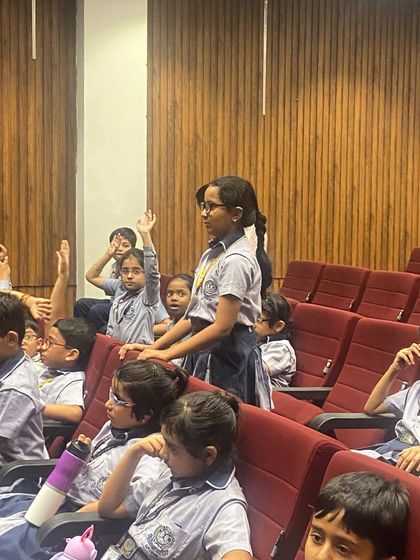 Eager hands go up during the Q&A part of our school workshop. We encourage curiosity and dialogue, creating a space where students feel empowered to ask questions and become active participants in climate action.