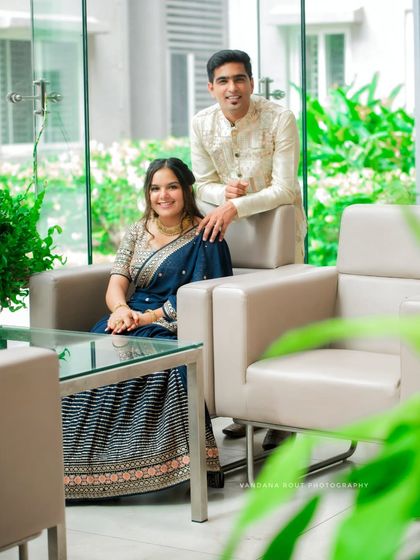 A wider angle of the couple during their indoor engagement shoot, showing the modern, clean environment. This demonstrates how I can utilize different locations to create a variety of couple portraits.