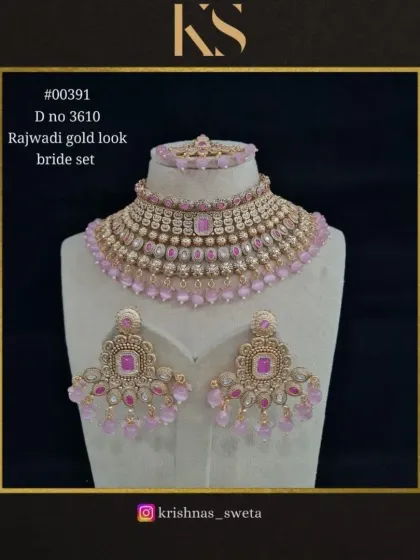The same exclusive Rajwadi bridal set, shown here in a beautiful pastel pink. This color variation offers a softer, more contemporary option for brides and bridesmaids.