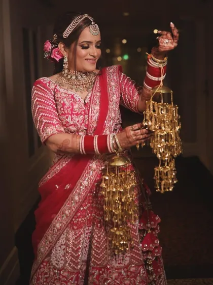 Capturing the joy of a bride. This photo shows how the makeup holds up beautifully, looking fresh and radiant even in candid moments.
