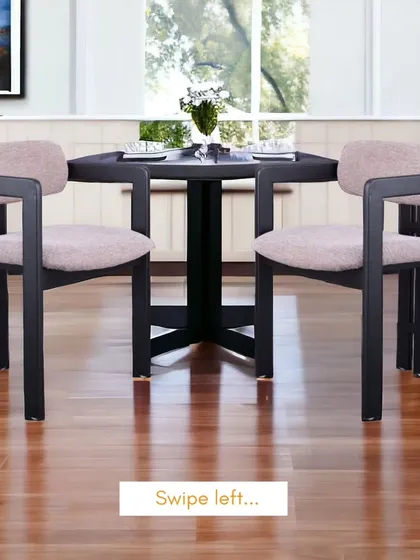 Here are two of our premium dining chairs paired with a matching black dining table, creating a complete, high-end dining set.