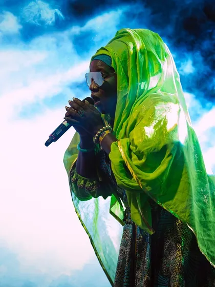 A powerful performance by a vocalist on the Goa Sunsplash stage, surrounded by atmospheric smoke. We work to create visually stunning moments that enhance the music.