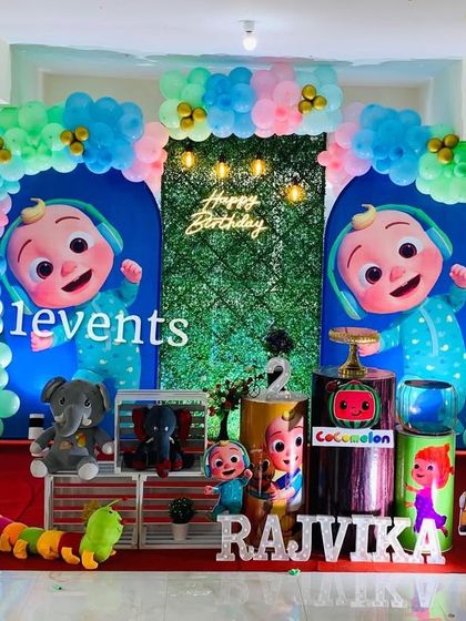 Another look at this popular Cocomelon setup, highlighting the marquee letters and plush toys.