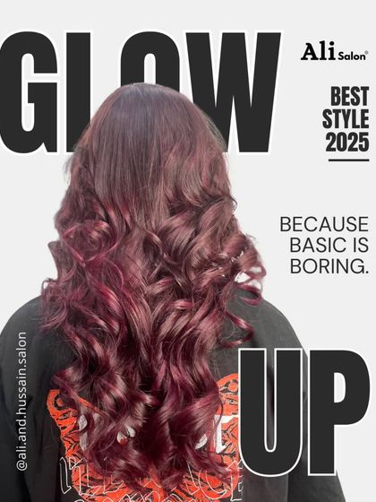 A graphic showcasing a beautiful magenta hair color with soft curls. This is for clients who know that basic is boring and are ready for a real glow-up.