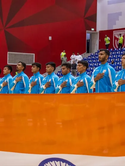 Another shot of the team during the national anthem before the match against Kuwait.