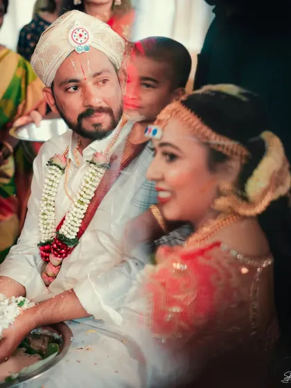 The groom's expression during a wedding ritual, captured with a soft, candid feel. We ensure both the bride and groom's stories are told throughout the day.
