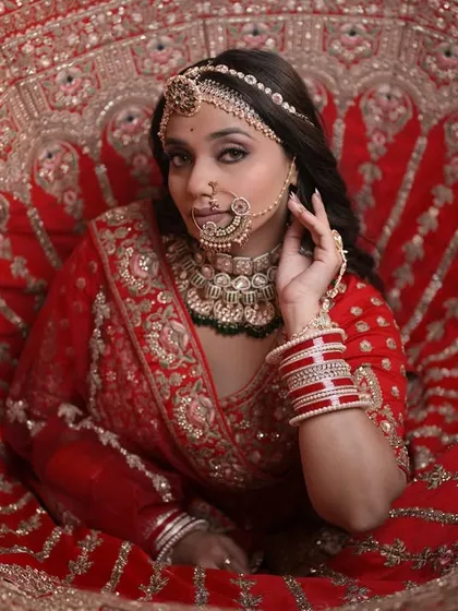 The final output of the Padmavati look. This dramatic shot, with the lehenga spread out, captures the grandeur and tragedy of the queen's story.