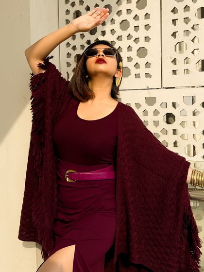 Looking up, feeling dramatic and powerful. This outfit is all about making a statement.