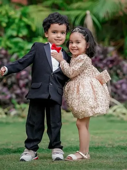 A sweet hug between a brother and sister during their outdoor photoshoot. Capturing these moments of affection between siblings is one of our favorite things.