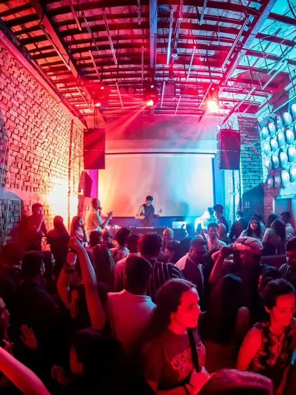 The red and blue lighting at Roxy, Kolkata, creates a cool, moody atmosphere. Here is a shot of the crowd vibing early in the night.