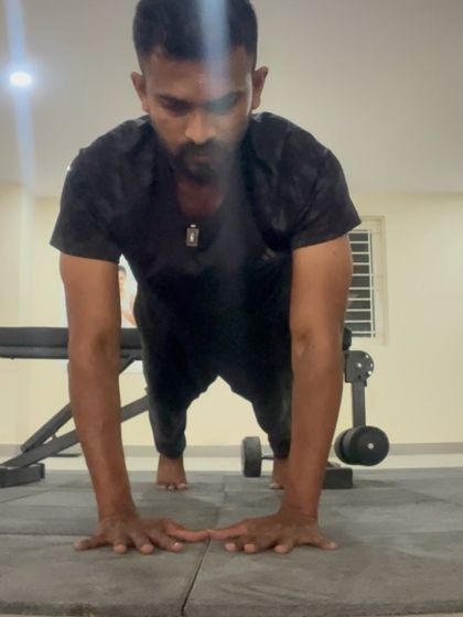 A standard pushup with perfect form, the foundation of upper body strength.