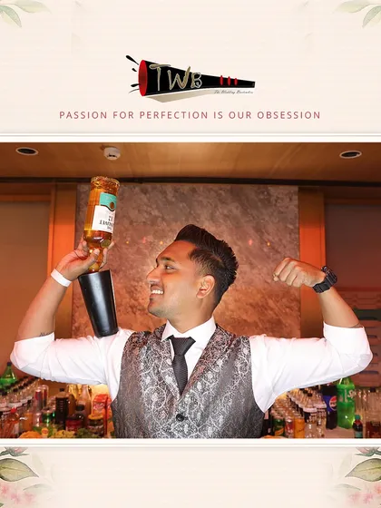 A bartender shows off his strength and skill, adding a fun and energetic vibe to the Sangeet night.
