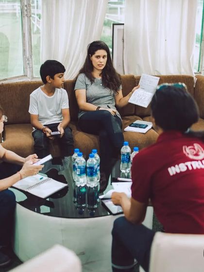 Our instructor leads a theory session, explaining the principles of horsemanship and horse care to new students.