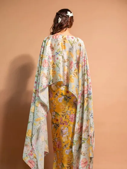 A view of the beautiful hairstyle with floral accessories for the Riddhi Jain Label campaign.