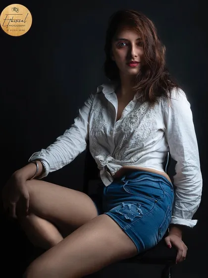 Another shot from the same studio session, this time with a slightly different pose that highlights the model's full physique. Providing a variety of poses is key for a strong portfolio.