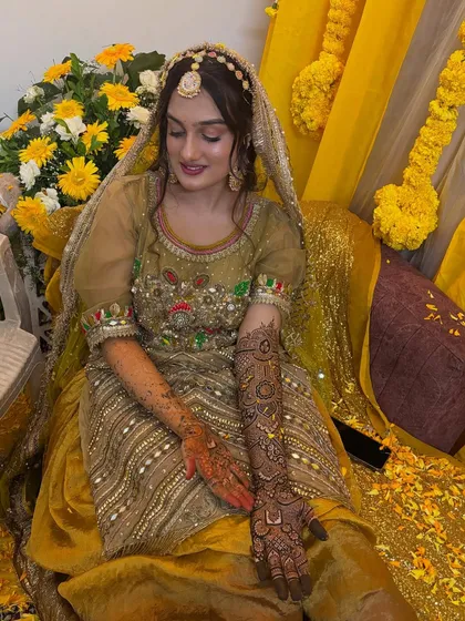 A candid moment of the bride admiring her mehendi. I love capturing these little moments of happiness.