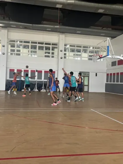 Action from an indoor practice match. Players are seen running a fast break, a key part of our offensive strategy.