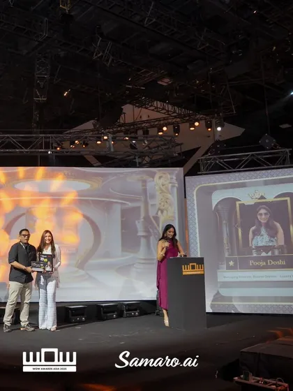 A wide shot of the awards ceremony stage. Being recognized on such a grand platform in front of my peers is an unforgettable experience.