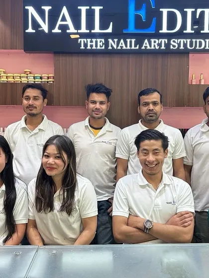 A group photo of our skilled Nail Edit team. We pride ourselves on our professionalism and artistry, and we look forward to welcoming you to our studio.