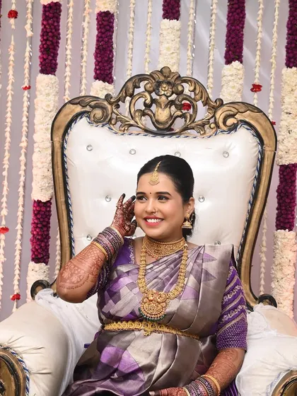 A happy, candid moment from Sahana's baby shower. Her makeup is designed to look flawless and feel comfortable throughout the event.
