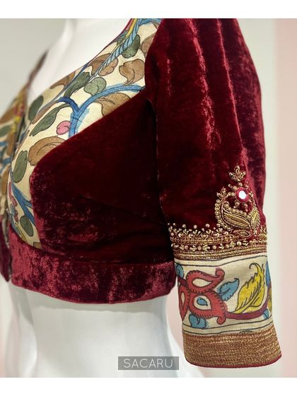 A side view of the Kalamkari and velvet patchwork blouse, highlighting the juxtaposition of textures and the intricate embroidery.