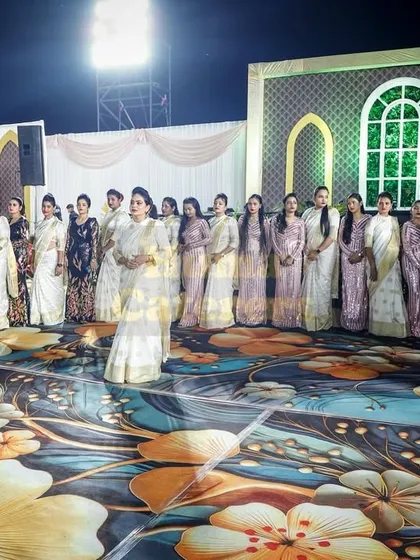 Our female staff members elegantly dressed in coordinated sarees, showcasing the diversity and professionalism of our team.