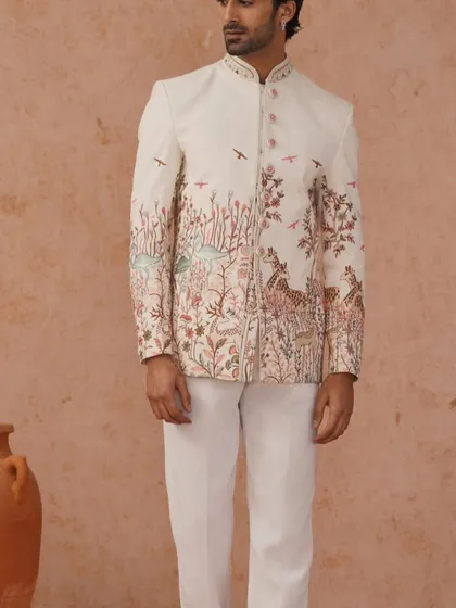 A gallery of our Jodhpuri and Indo-Western designs, showing the variety of fabrics, embroidery styles, and custom fits available for your special occasion.