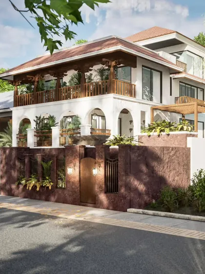 Another angle of the seaside villa, providing a more comprehensive view of the property's layout and its blend of architectural styles.