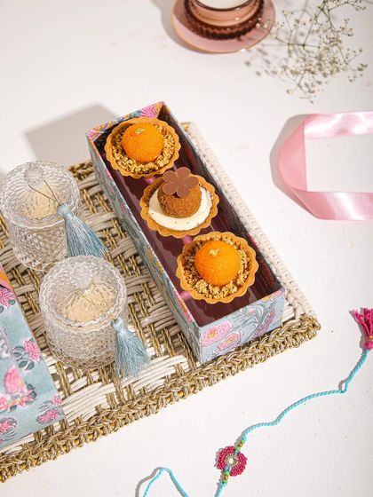 Our Mithai Tartlets and decorative jars, part of our Rakhi hamper, are perfect for sweetening sibling bonds.