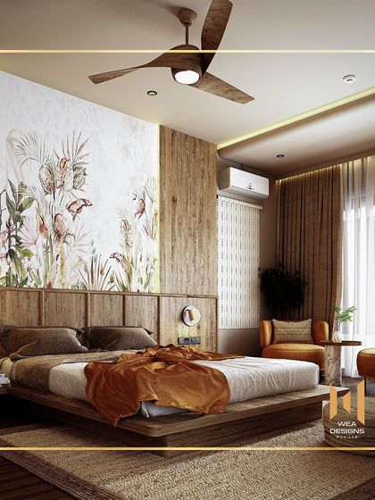 This bedroom at Phoenix One blends contemporary design with natural elements, using a wood-paneled accent wall and a large botanical mural.