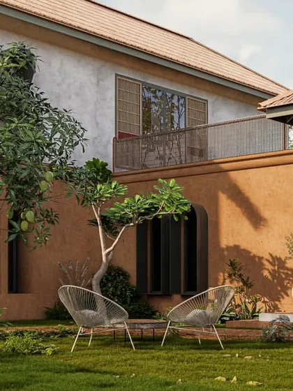 The rendering showcases how the home would sit in harmony with its environment, using earthy colors and natural materials.
