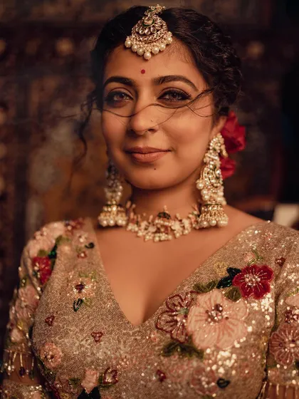 Styling actress Leona Lishoy in this ornate, sequined lehenga was about creating a moment of cinematic beauty. The focus was on the intricate floral embroidery and pairing it with heavy, traditional jewelry for a truly opulent feel.