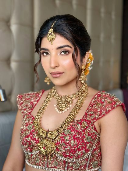 This close-up highlights the flawless skin and soft eye makeup, key components of the signature style I teach.