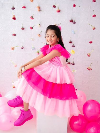 Celebrating double digits! I also do milestone shoots for older children, like this fun and fashionable 10th birthday session with a vibrant pink theme.