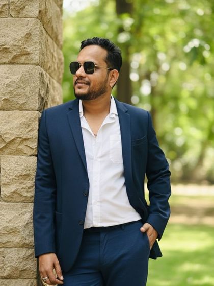 A classic navy blue suit is a must have for any man's wardrobe, and now you can rent it. This is a great option for formal events, from weddings to corporate functions.