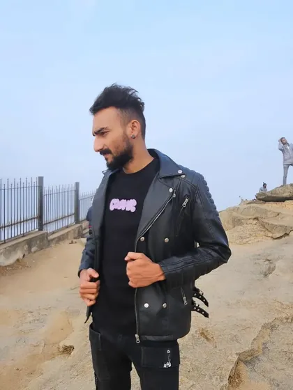 The classic black leather jacket look. It's a staple of my style, representing a timeless cool.