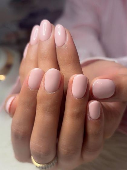 A close-up of the beautiful baby pink gel polish.